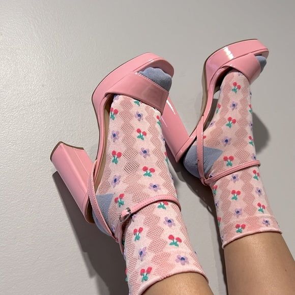 Pink patent heels