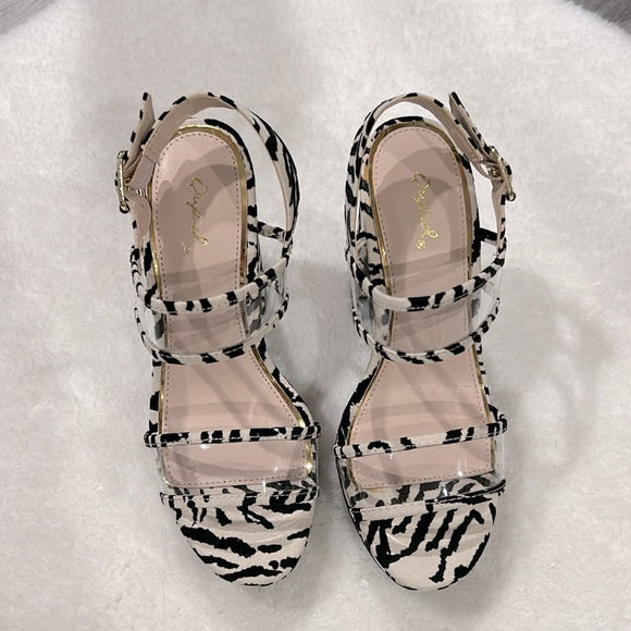 Zebra print suede heels