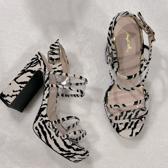 Zebra print suede heels