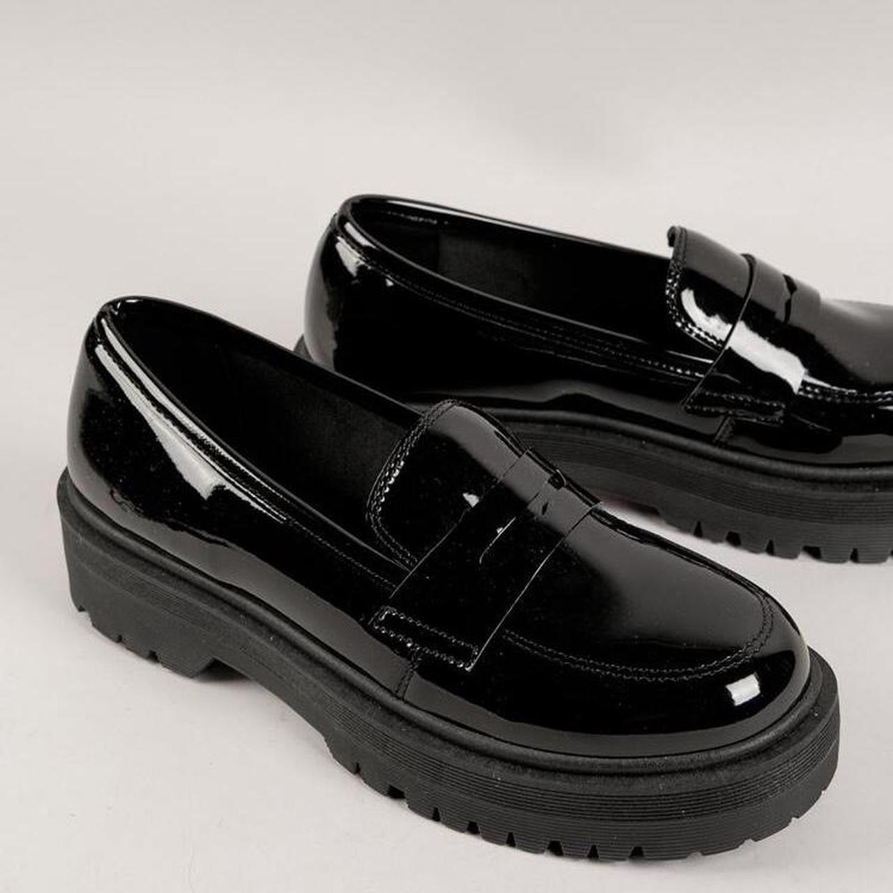 Black platform loafers